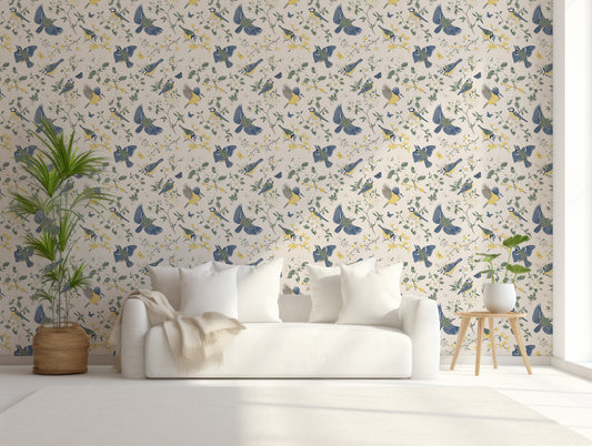 Adriana Wallpaper In Living Room With White Sofa, Blankets And Cushions With Green Plants