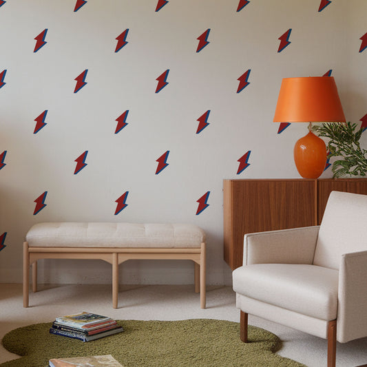 Bolt in room with orange lamp and green rug