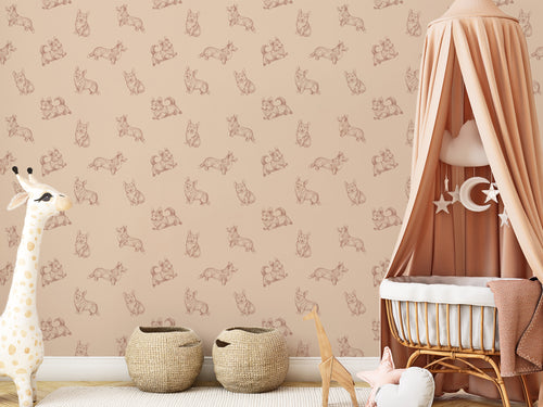 Corgia Wallpaper In Children's Cot Covered in Beige Fabric With Toy Giraffe